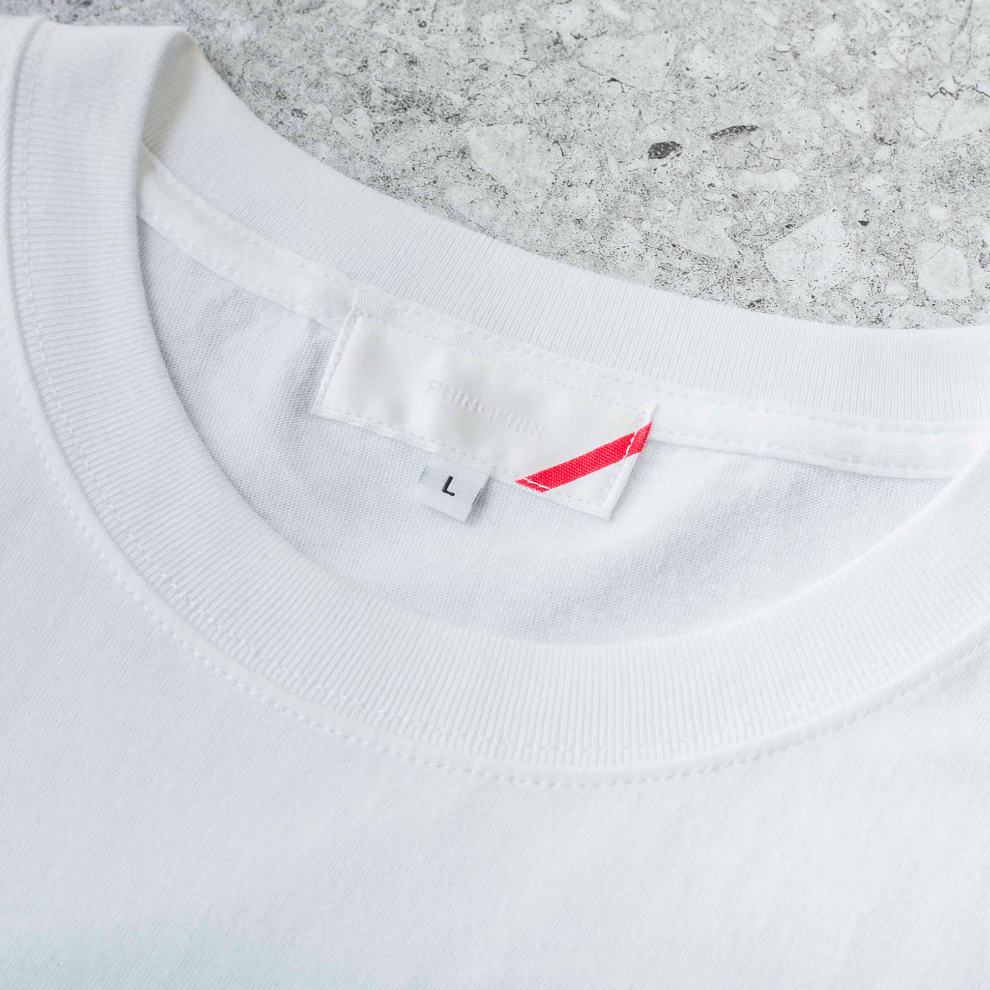 P-Zip Tee Si by PHINGERIN sold at nation Osaka.